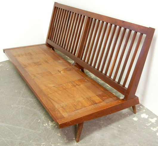 Nakashima 1954 walnut sofa from a living room suite to be auctioned in three lots. Stephenson’s Auctioneers image.